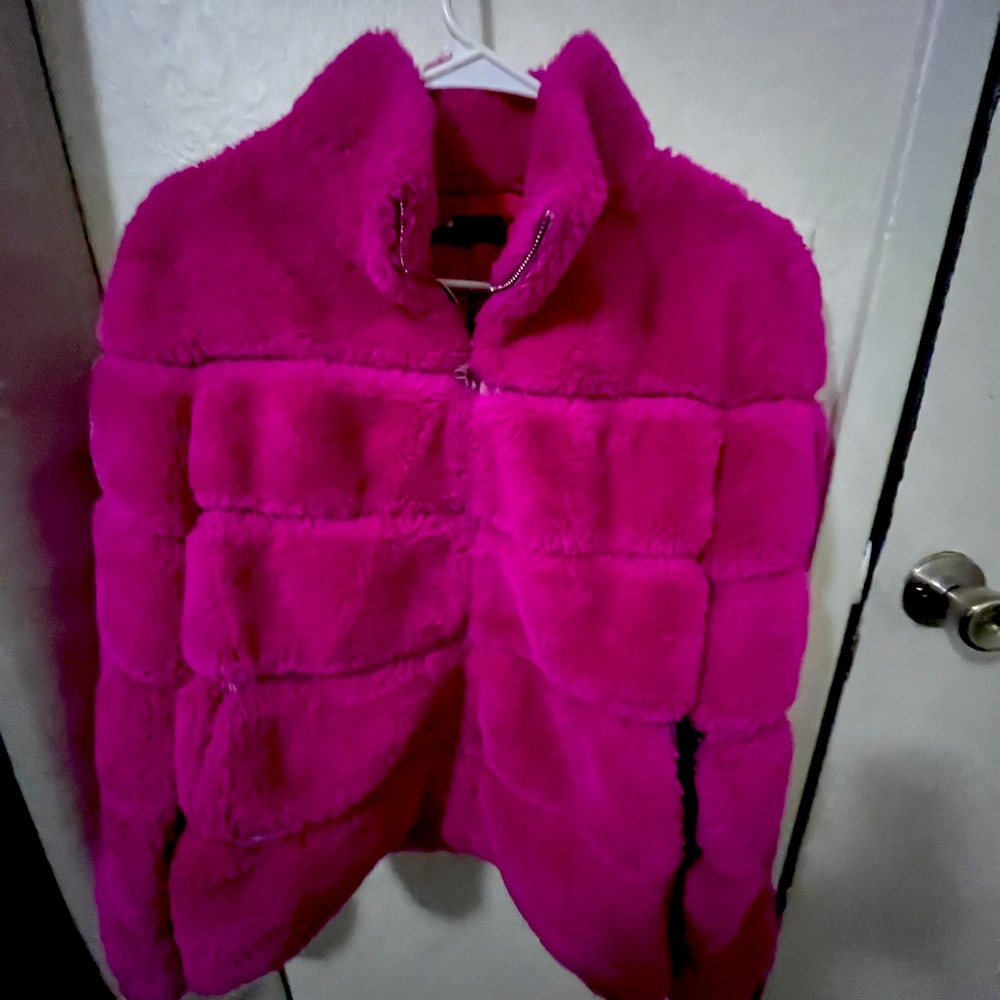 Faux Fur Jacket Size is Small 
Brand love token